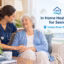 A home health care nurse comforts a smiling senior woman in a bright Indian River Shores, Florida, home.